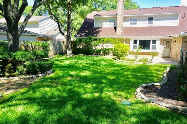 a view of a garden with a fountain