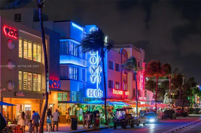 a front view of multi story building with retail shops