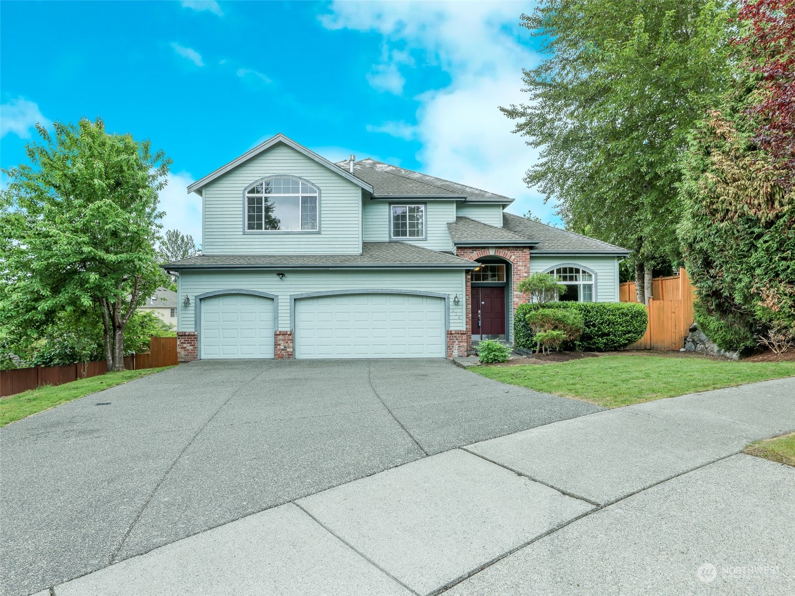336 210 Street Southeast Bothell, WA 98021 - Photo 1 of 1 a front view of house with yard and trees