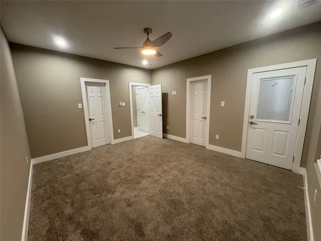 a bathroom with a shower and a toilet