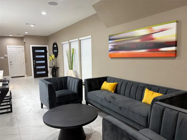 an empty room with a empty space and windows