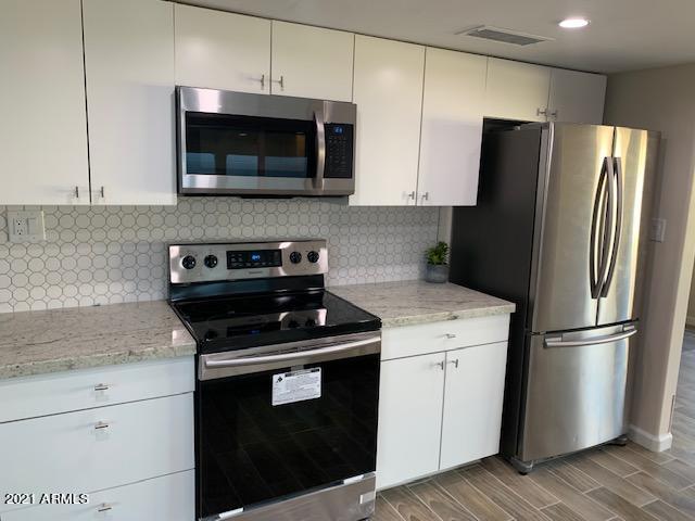 4028 West Griswold Road Phoenix, AZ 85051 - Photo 3 of 17 IMG_9949