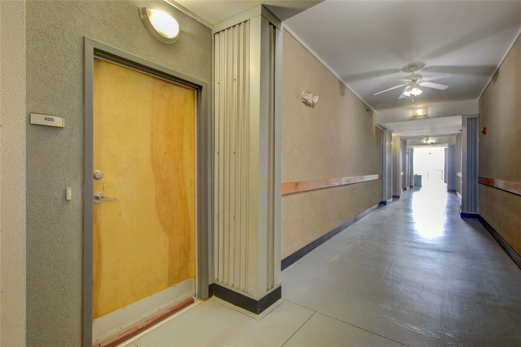 2630 Talley Street, Unit 405 Decatur, GA 30030 - Photo 1 of 1 a view of a hallway with wooden floor