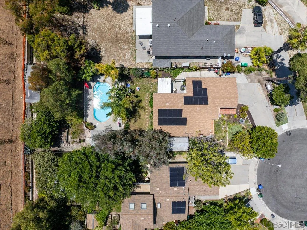 2337 Fallingleaf Road Oceanside, CA 92056 - Photo 33 of 34 an aerial view of a house with a yard and garden