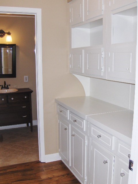 4660 Arkwright Road Macon, GA 31210 - Photo 11 of 32 a view of walk in closet with a mirror