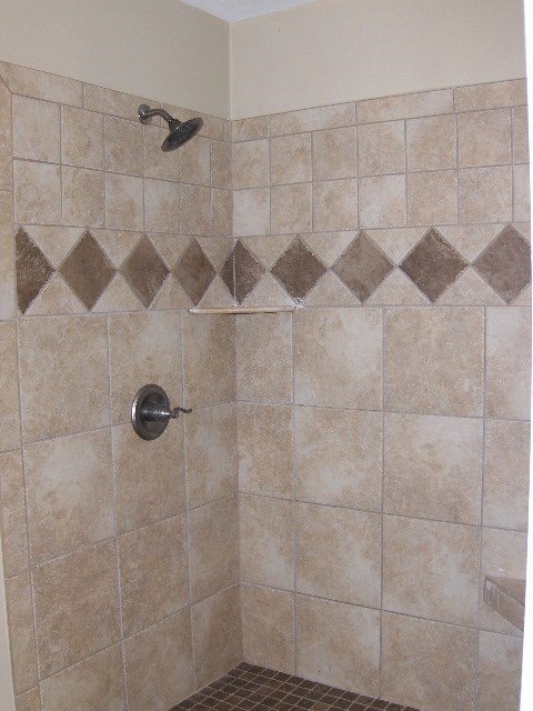 4660 Arkwright Road Macon, GA 31210 - Photo 16 of 32 a bathroom with a shower