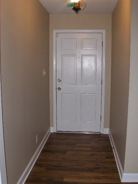 4660 Arkwright Road Macon, GA 31210 - Photo 4 of 32 a view of an empty room with wooden floor