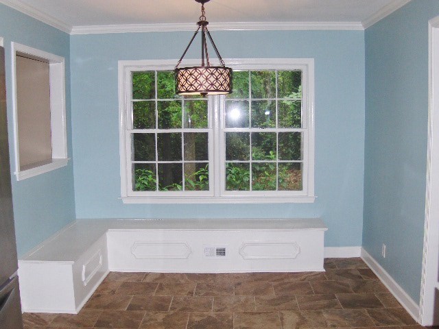 4660 Arkwright Road Macon, GA 31210 - Photo 8 of 32 a bathroom with a bathtub and window