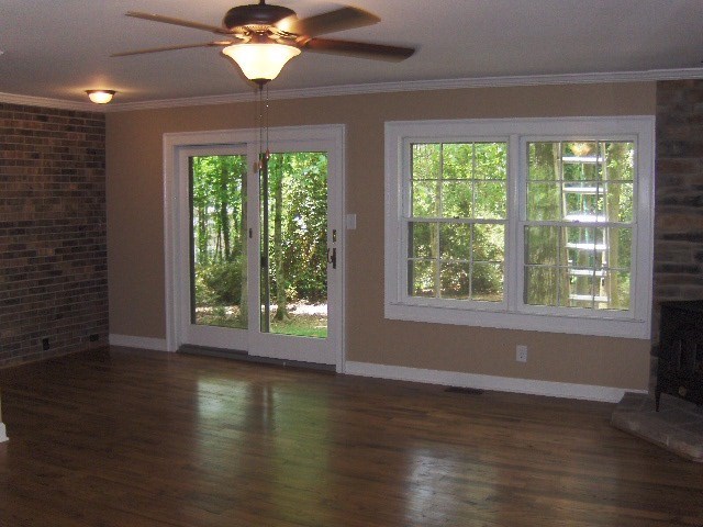 4660 Arkwright Road Macon, GA 31210 - Photo 10 of 32 a view of a room with wooden floor and a window