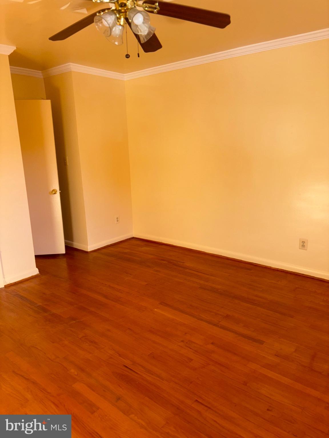 7044 Eastern Avenue Northwest Washington, DC 20012 - Photo 12 of 18 a view of a room with wooden floor