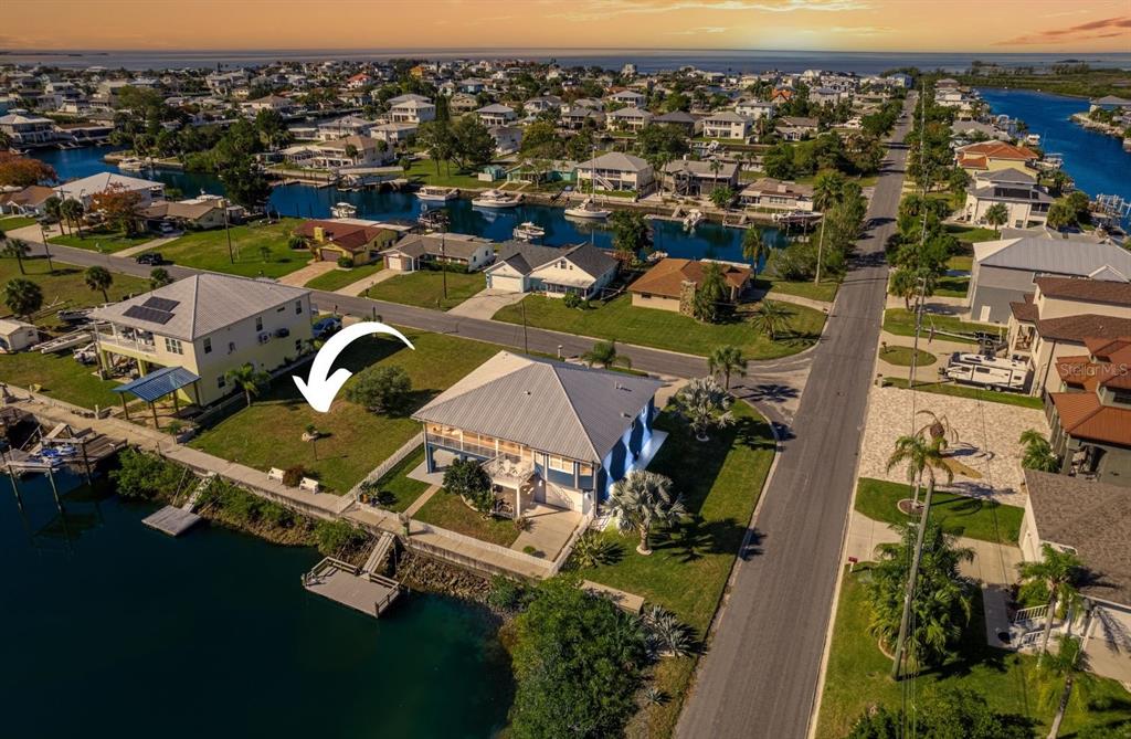 4502 Bahama Drive Hernando Beach, FL 34607 - Photo 14 of 28 an aerial view of residential houses with outdoor space