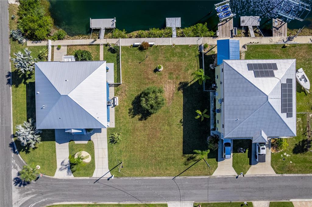 4502 Bahama Drive Hernando Beach, FL 34607 - Photo 27 of 28 an aerial view of a house with a garden