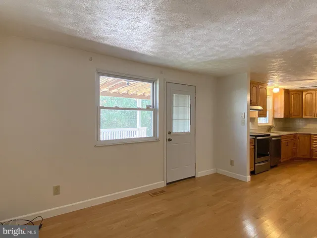 a view of a room with racks on the wall