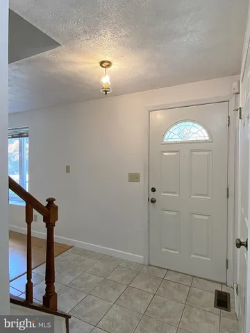 a bathroom with a sink toilet and a mirror