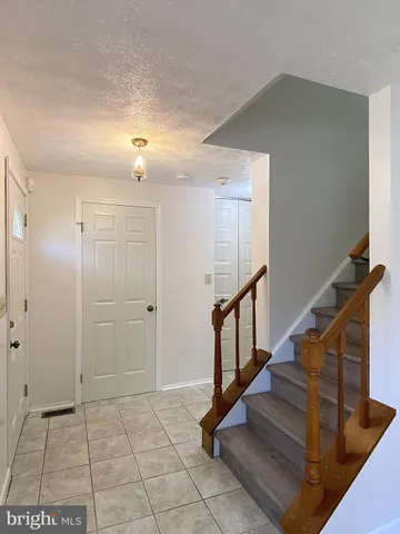a bathroom with a sink a toilet and a bathtub