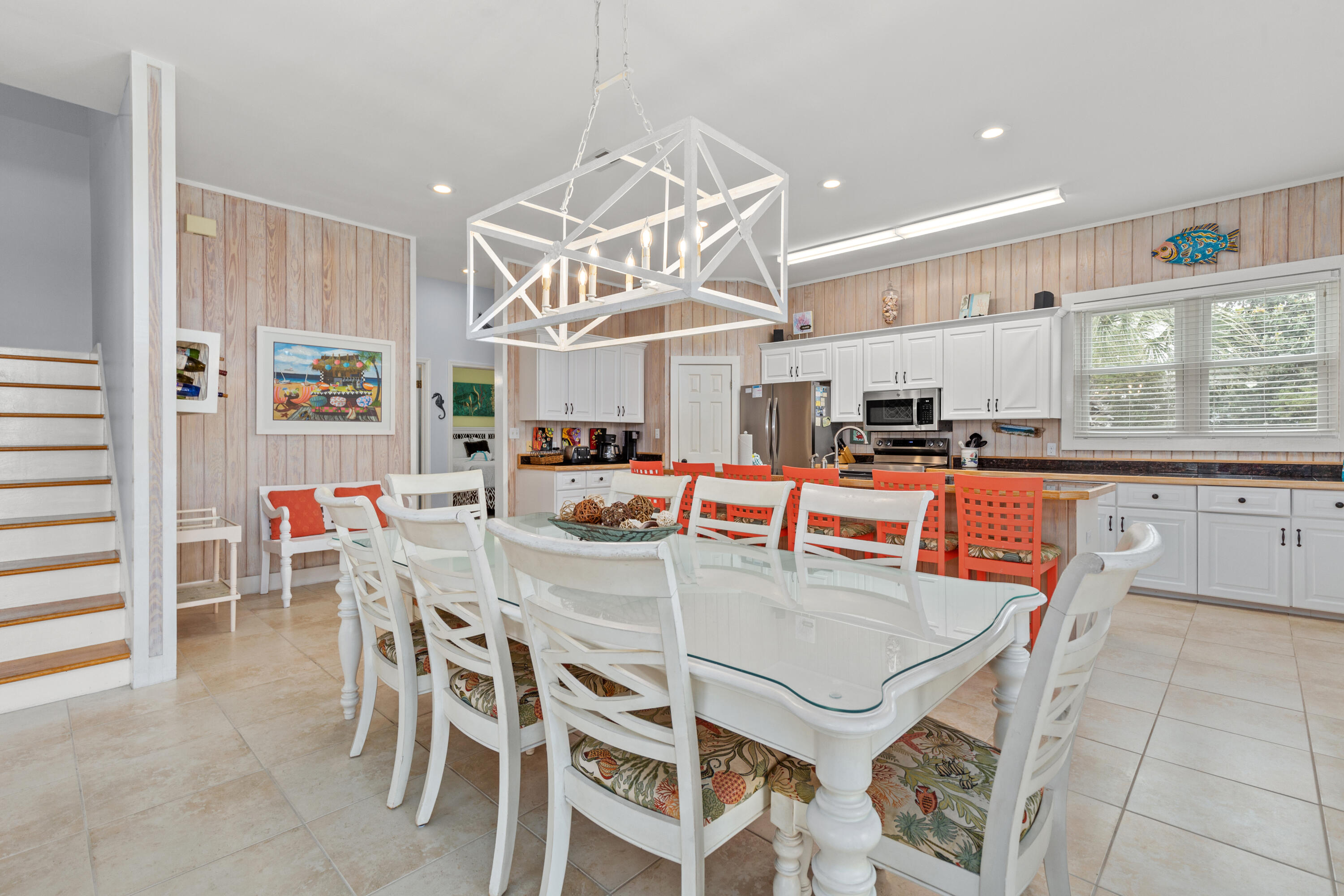 2305 South Co Highway 83 Santa Rosa Beach, FL 32459 - Photo 14 of 36 a dining table with chairs and kitchen view