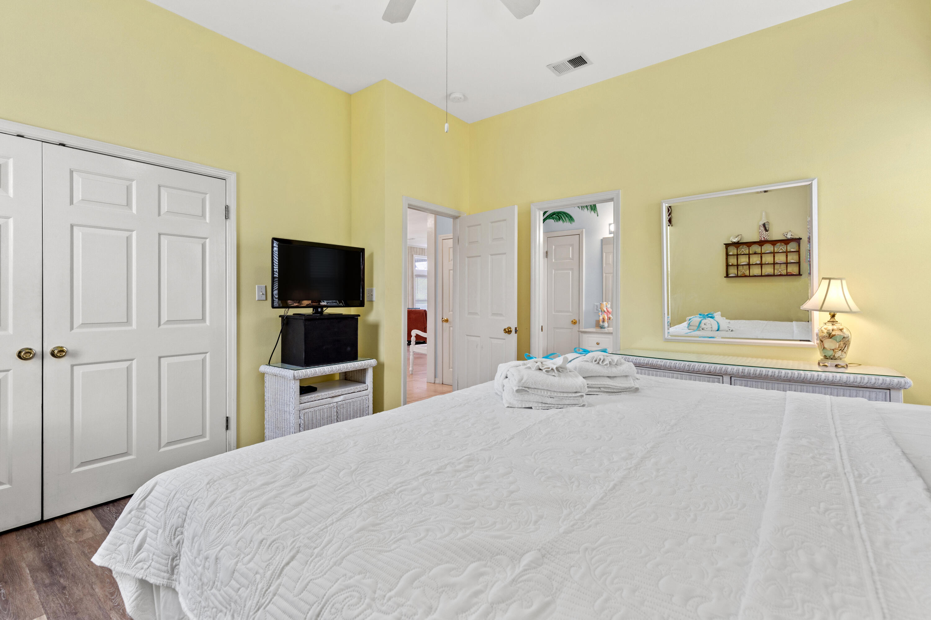 2305 South Co Highway 83 Santa Rosa Beach, FL 32459 - Photo 22 of 36 a bedroom with a bed and a flat screen tv