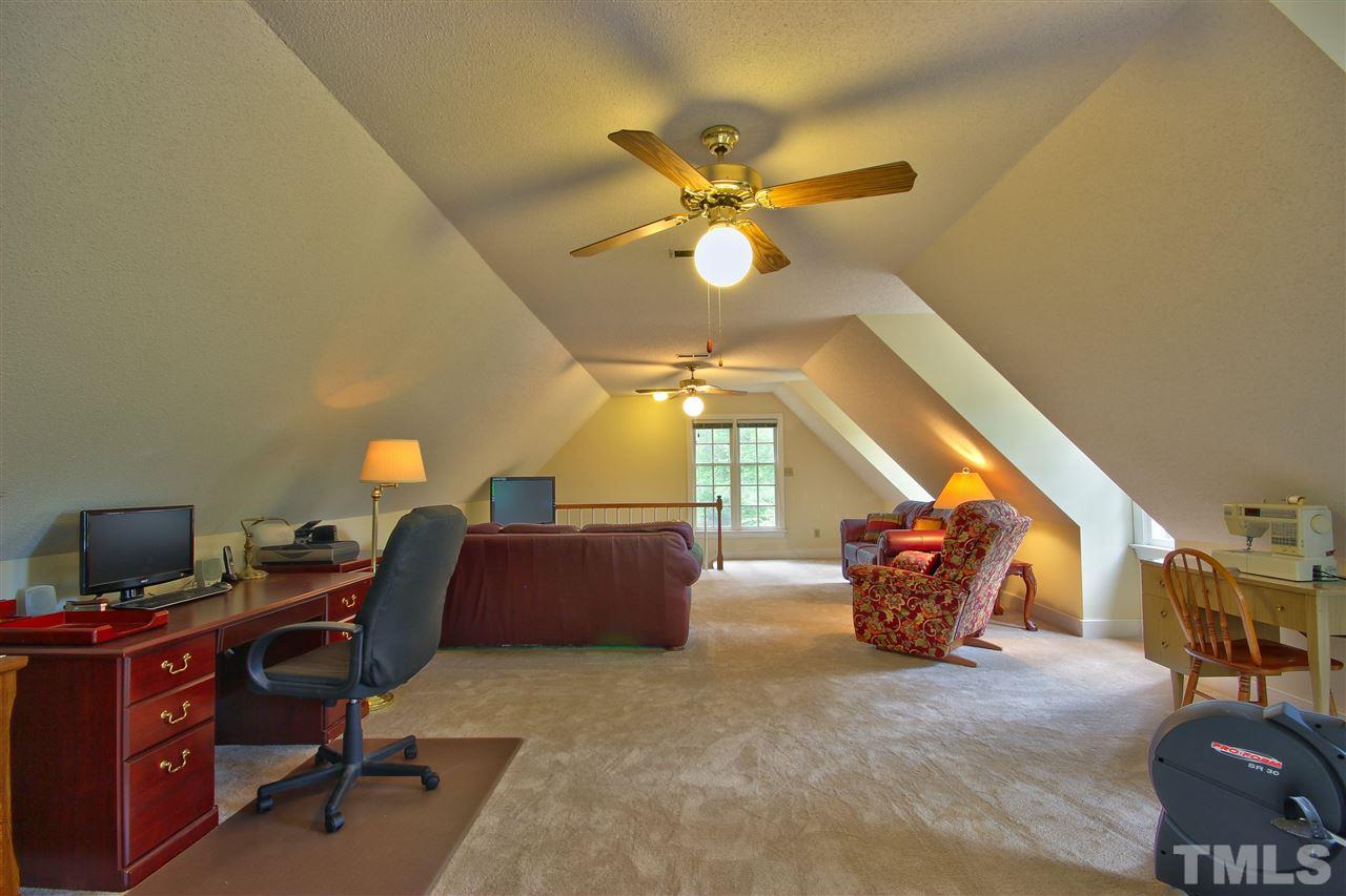 10520 New Arden Way Raleigh, NC 27613 - Photo 22 of 25 Huge multi-purpose bonus room with new carpet!