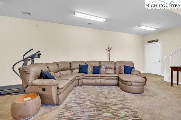 a living room with furniture and a couch