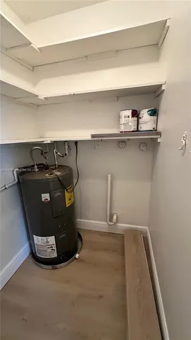 a view of storage and utility room