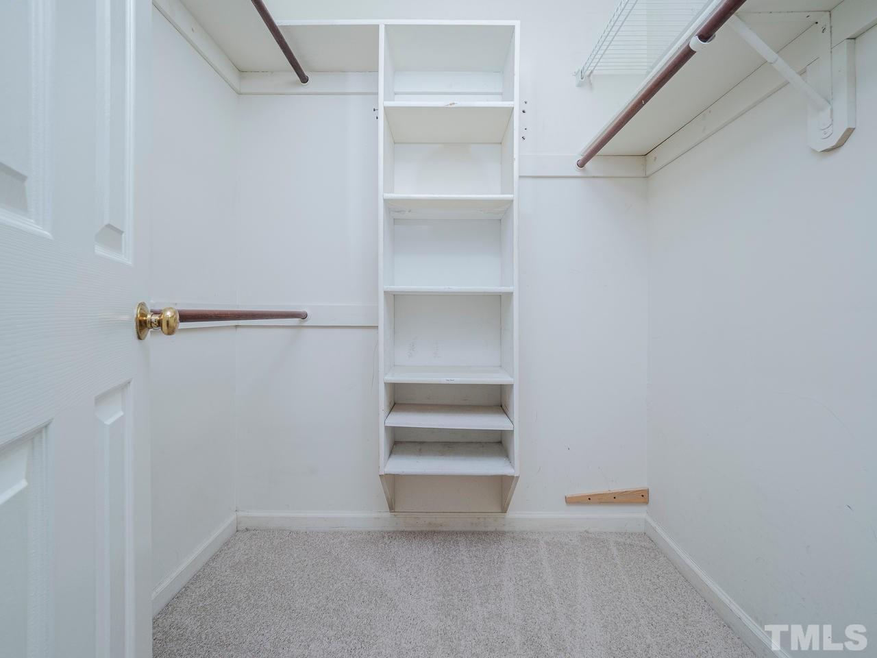 7100 Kinross Drive Raleigh, NC 27613 - Photo 14 of 24 a view of an empty walk in closet