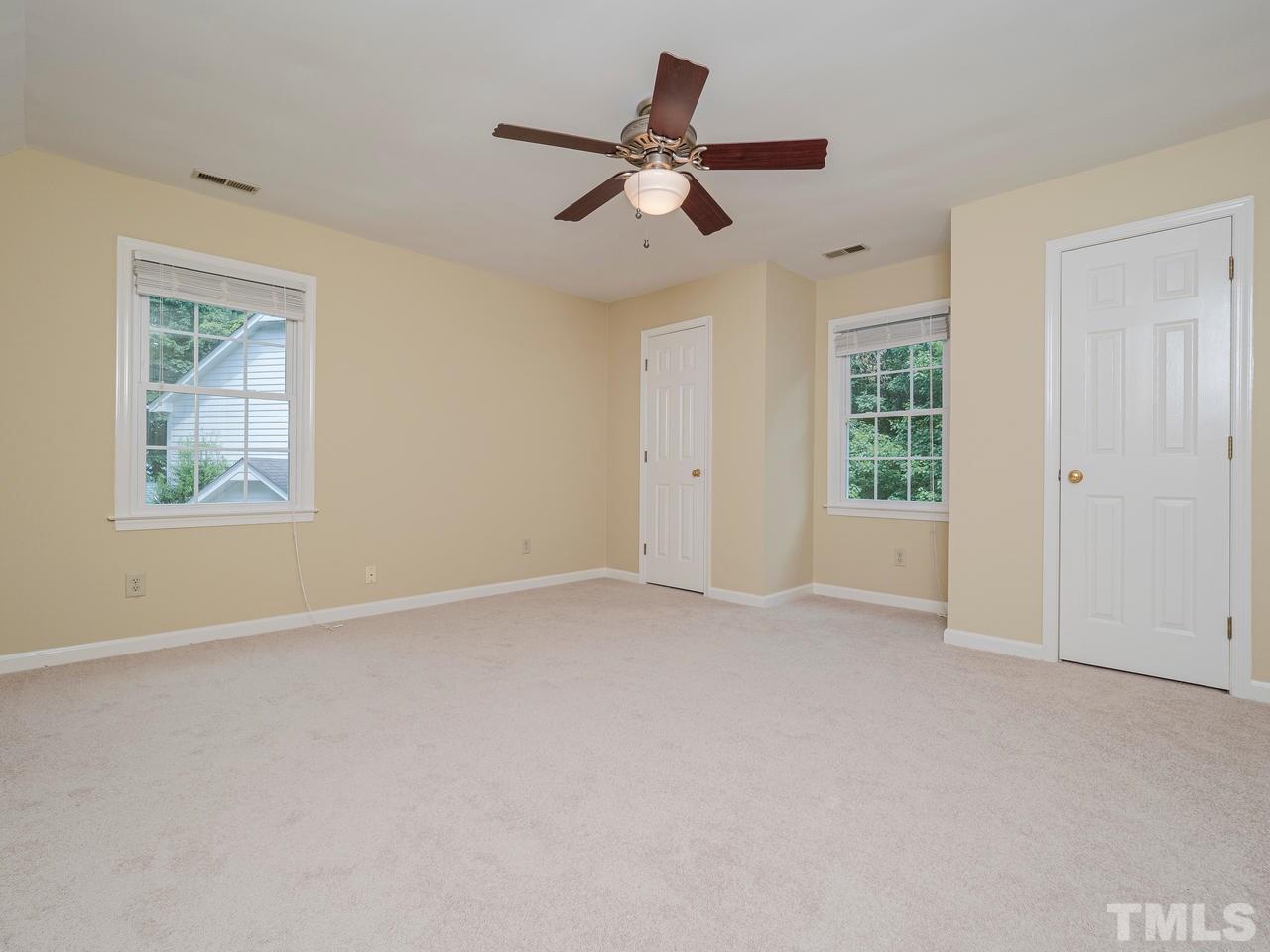 7100 Kinross Drive Raleigh, NC 27613 - Photo 18 of 24 a view of an empty room with a window