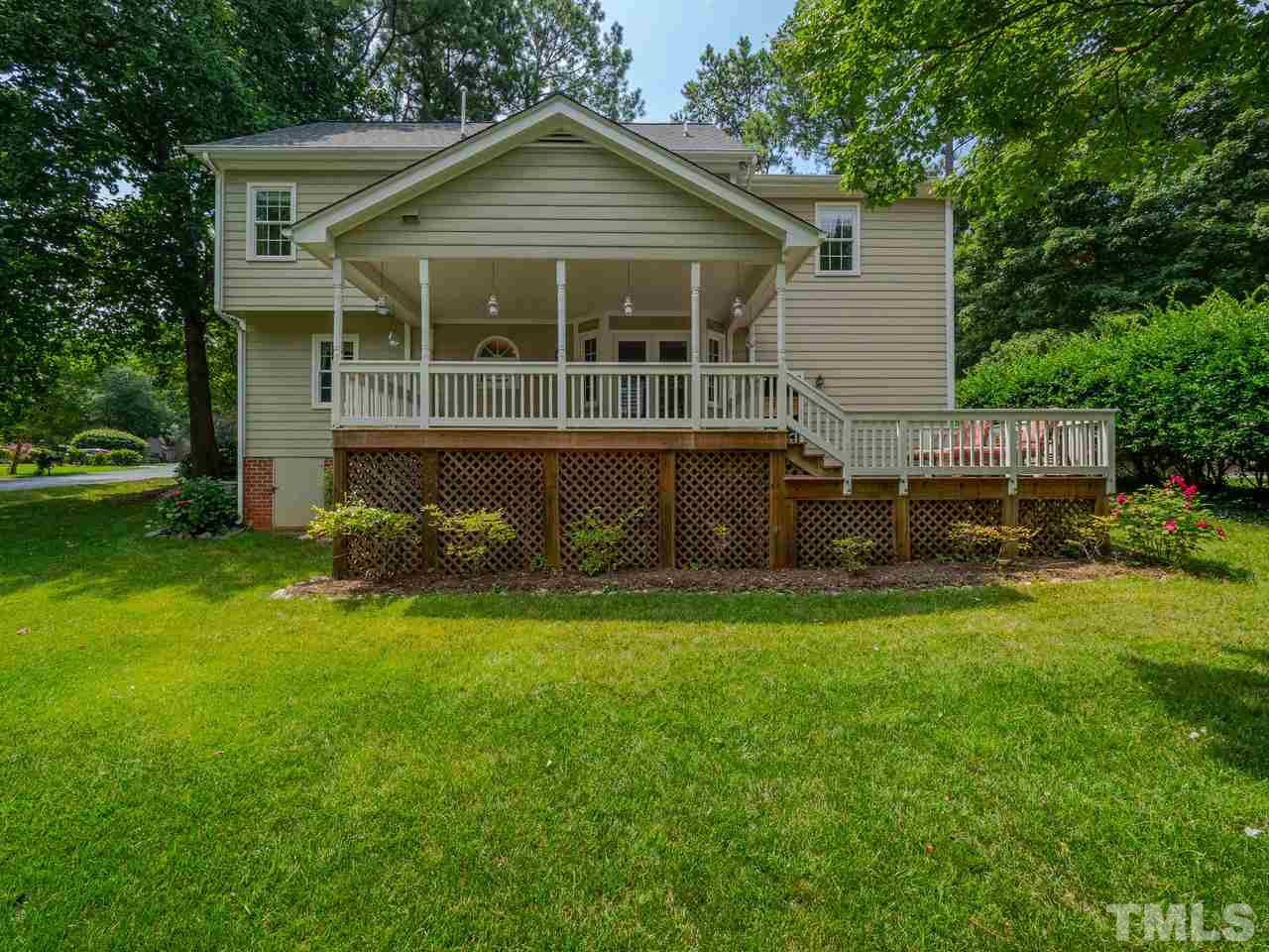 7100 Kinross Drive Raleigh, NC 27613 - Photo 24 of 24 a front view of a house with a garden