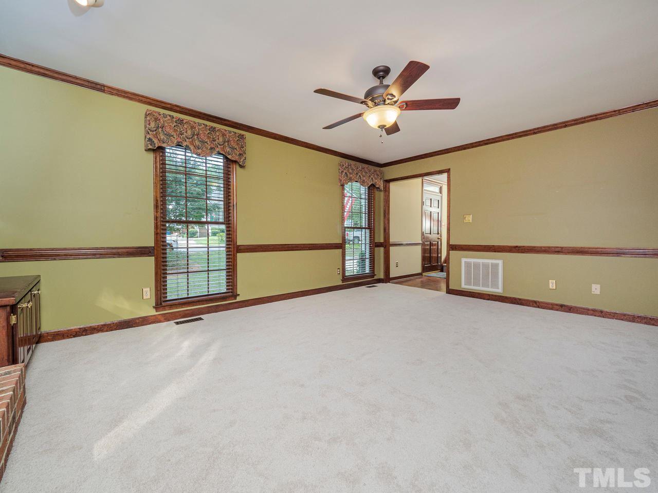7100 Kinross Drive Raleigh, NC 27613 - Photo 4 of 24 a view of an empty room with a window