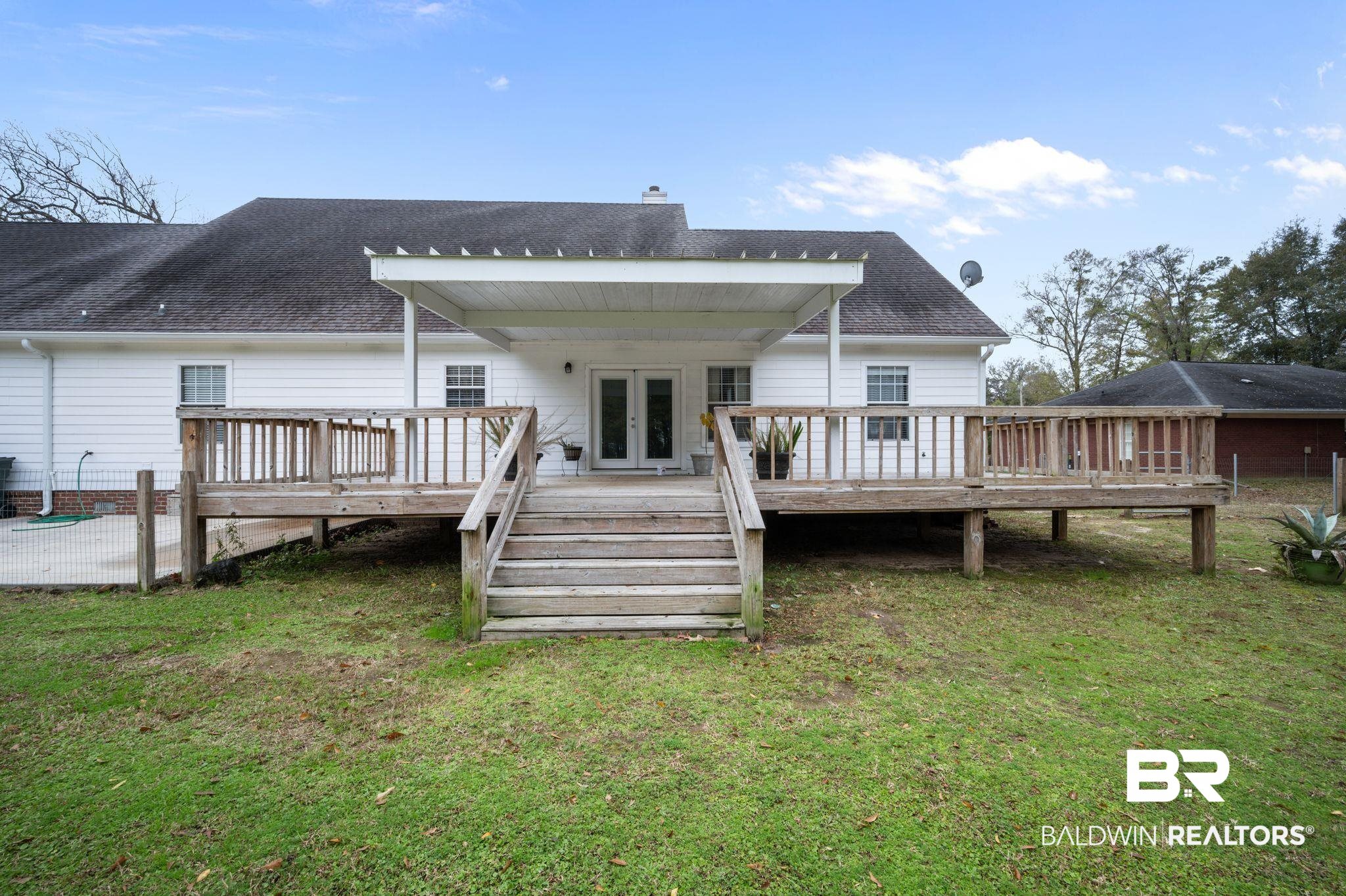 9539 Lakeview Road Bay Minette, AL 36507 - Photo 30 of 45 Back of house with a lawn, a patio area, a deck, and french doors