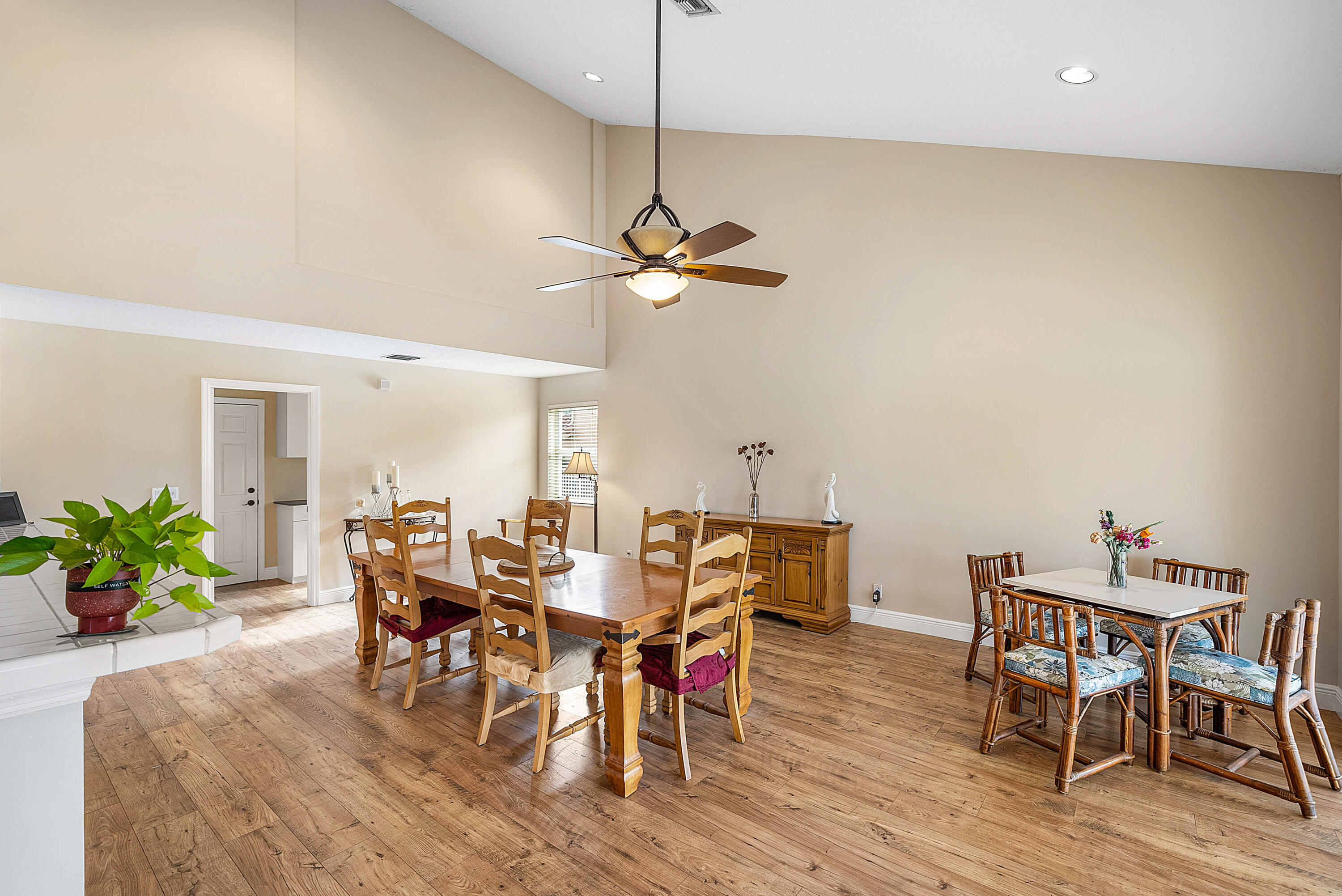 22345 Siesta Key Drive Boca Raton, FL 33428 - Photo 11 of 45 a view of a dining room with furniture and wooden floor
