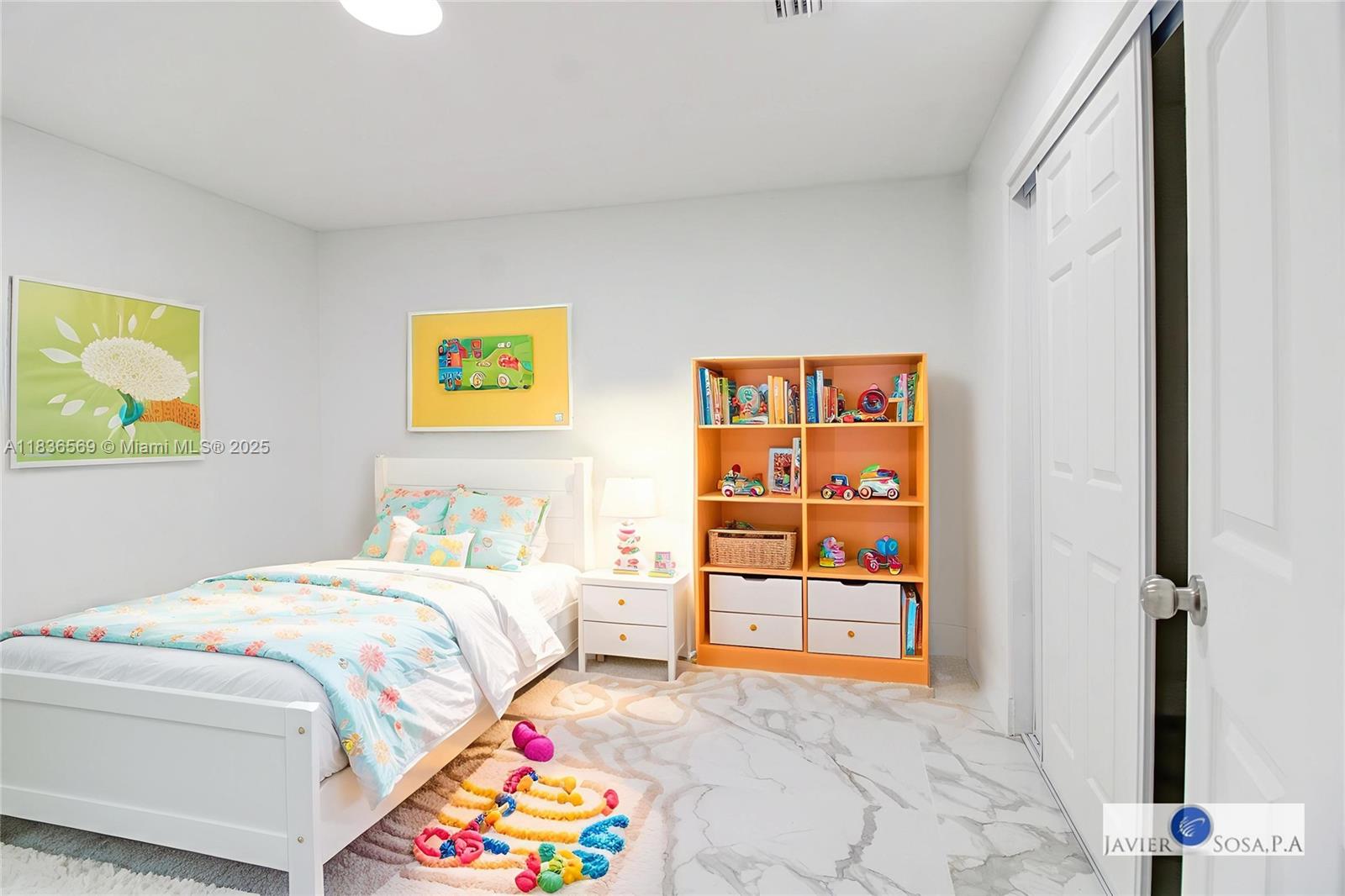 4808 Mango Drive Tamarac, FL 33319 - Photo 14 of 36 a bedroom with a bed and a painting on the wall