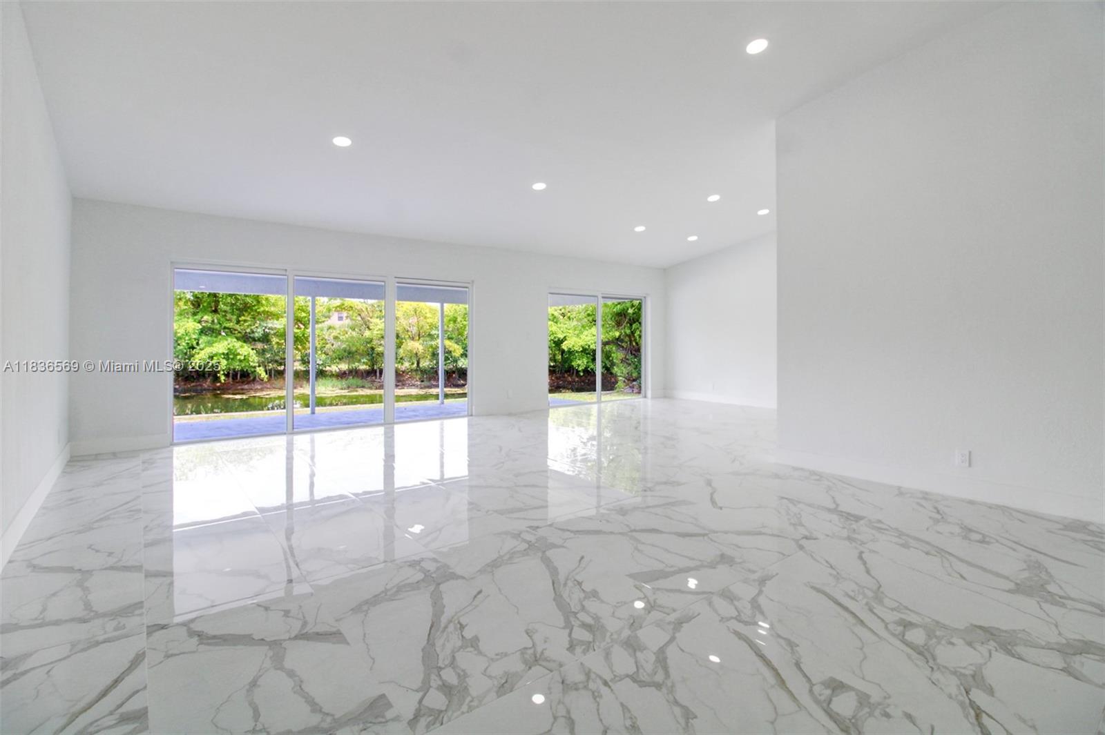 4808 Mango Drive Tamarac, FL 33319 - Photo 22 of 36 a view of an empty room with a window