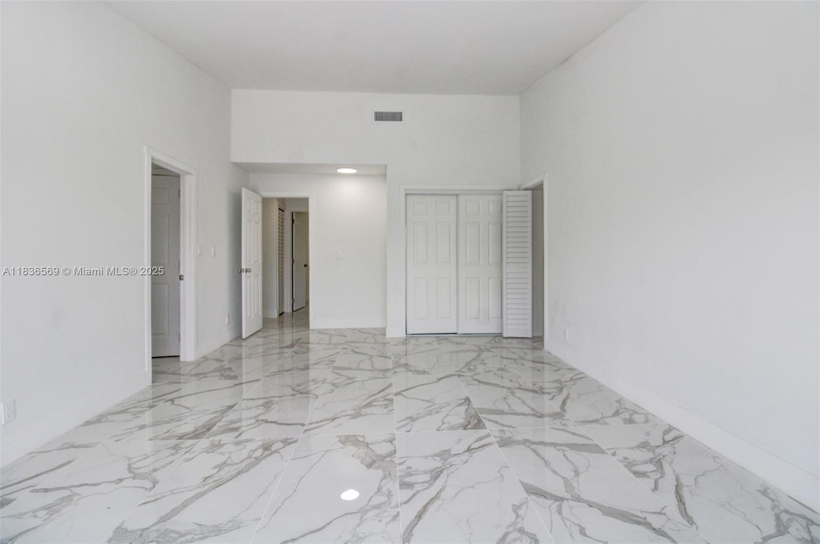 4808 Mango Drive Tamarac, FL 33319 - Photo 26 of 36 a view of an empty room