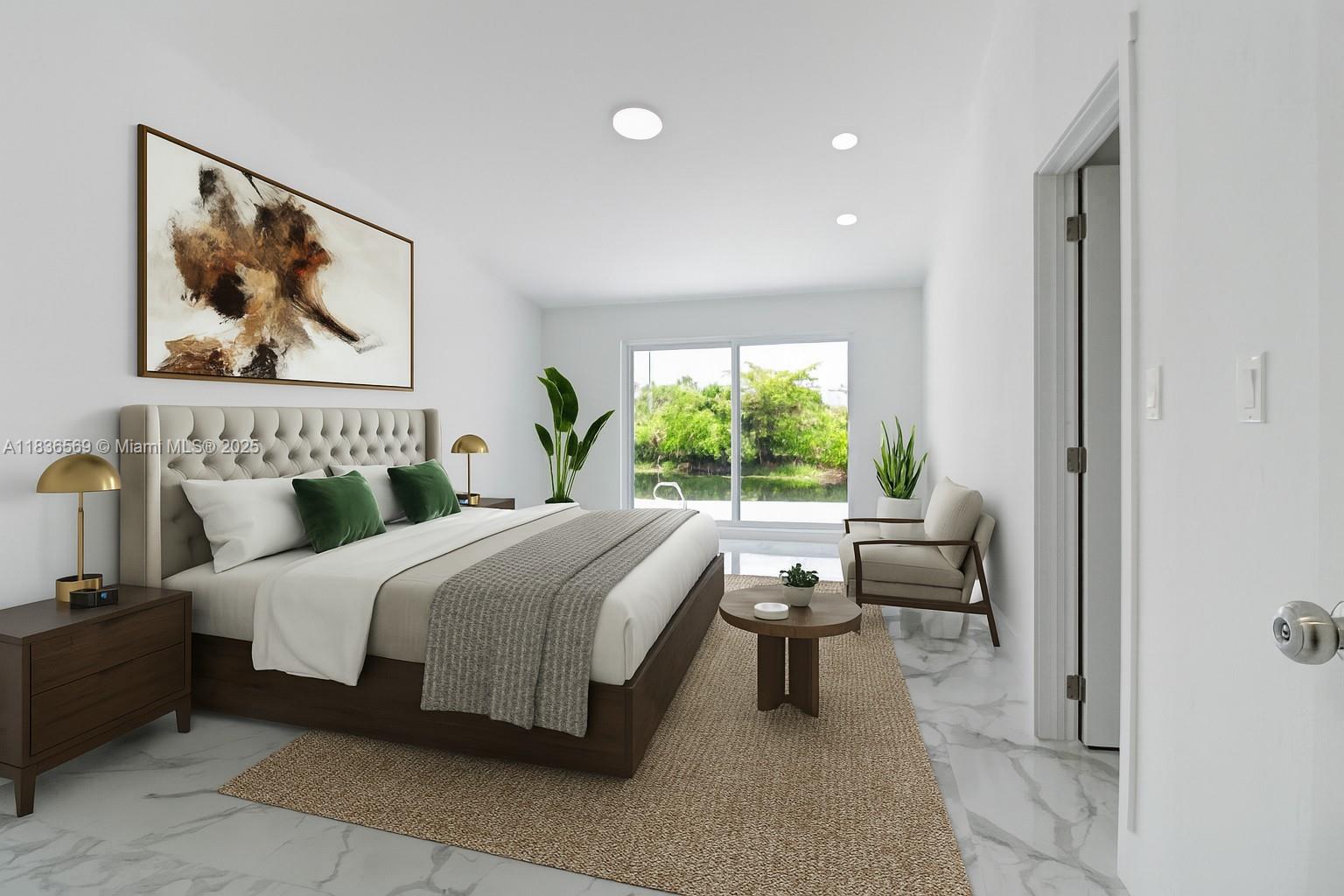 4808 Mango Drive Tamarac, FL 33319 - Photo 8 of 36 a bed room with a bed and a painting on the wall