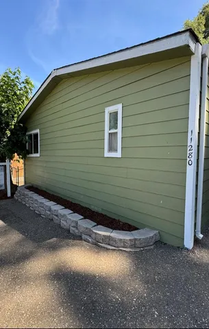 a view of a backyard of a house