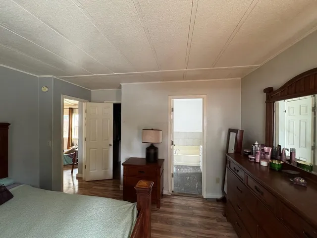 a view of a room with kitchen