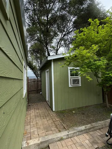 a house with trees in front of it