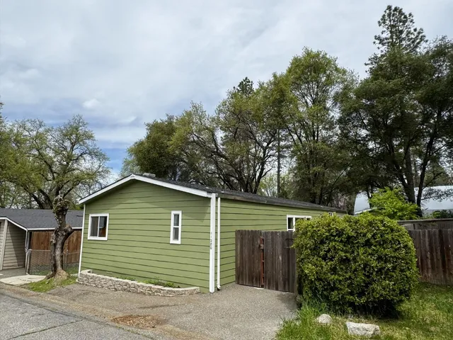 a front view of a house with a garage