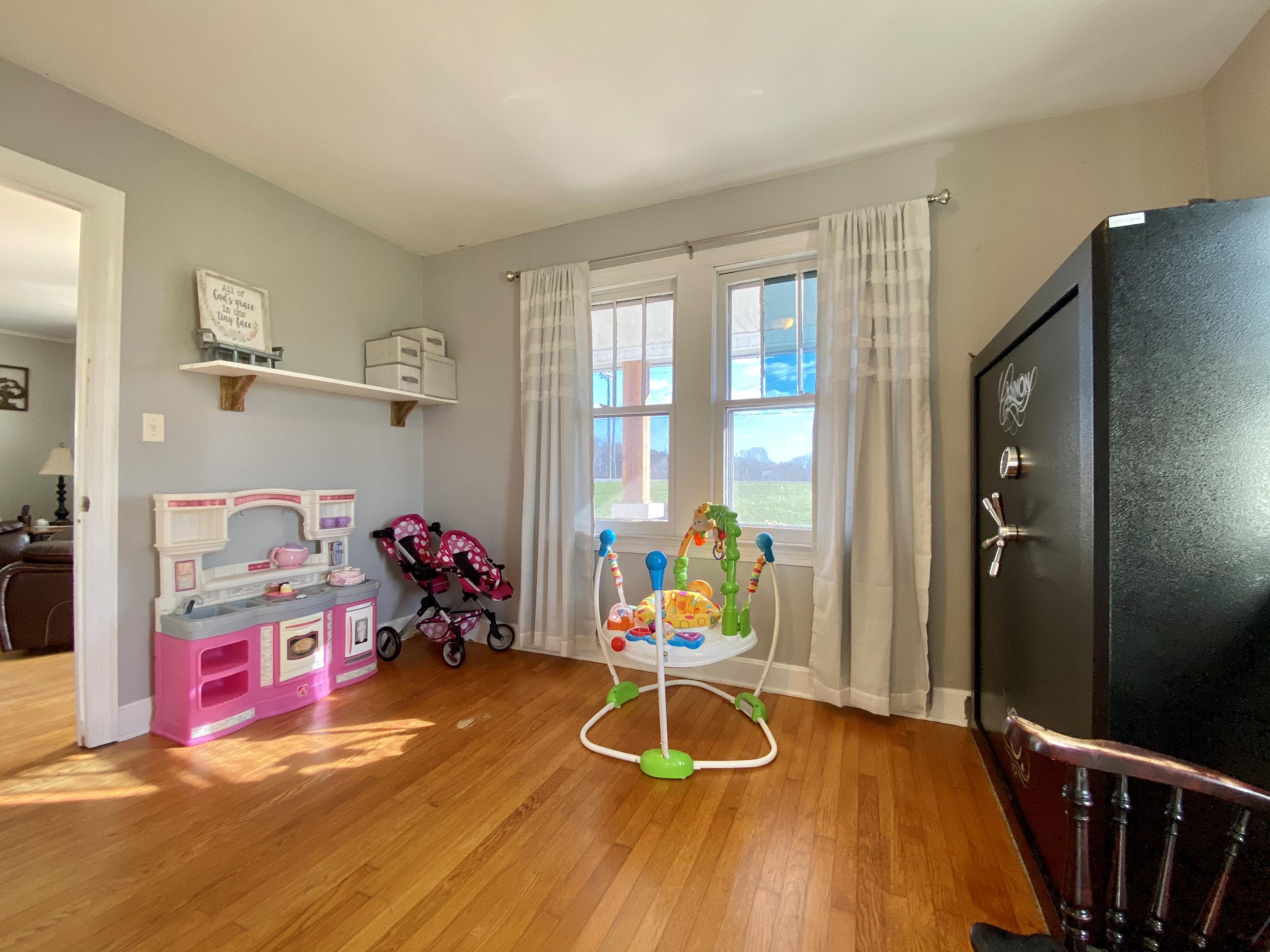 1121 Stone Mill Road Hurt, VA 24563 - Photo 25 of 28 a room with musical instruments and windows
