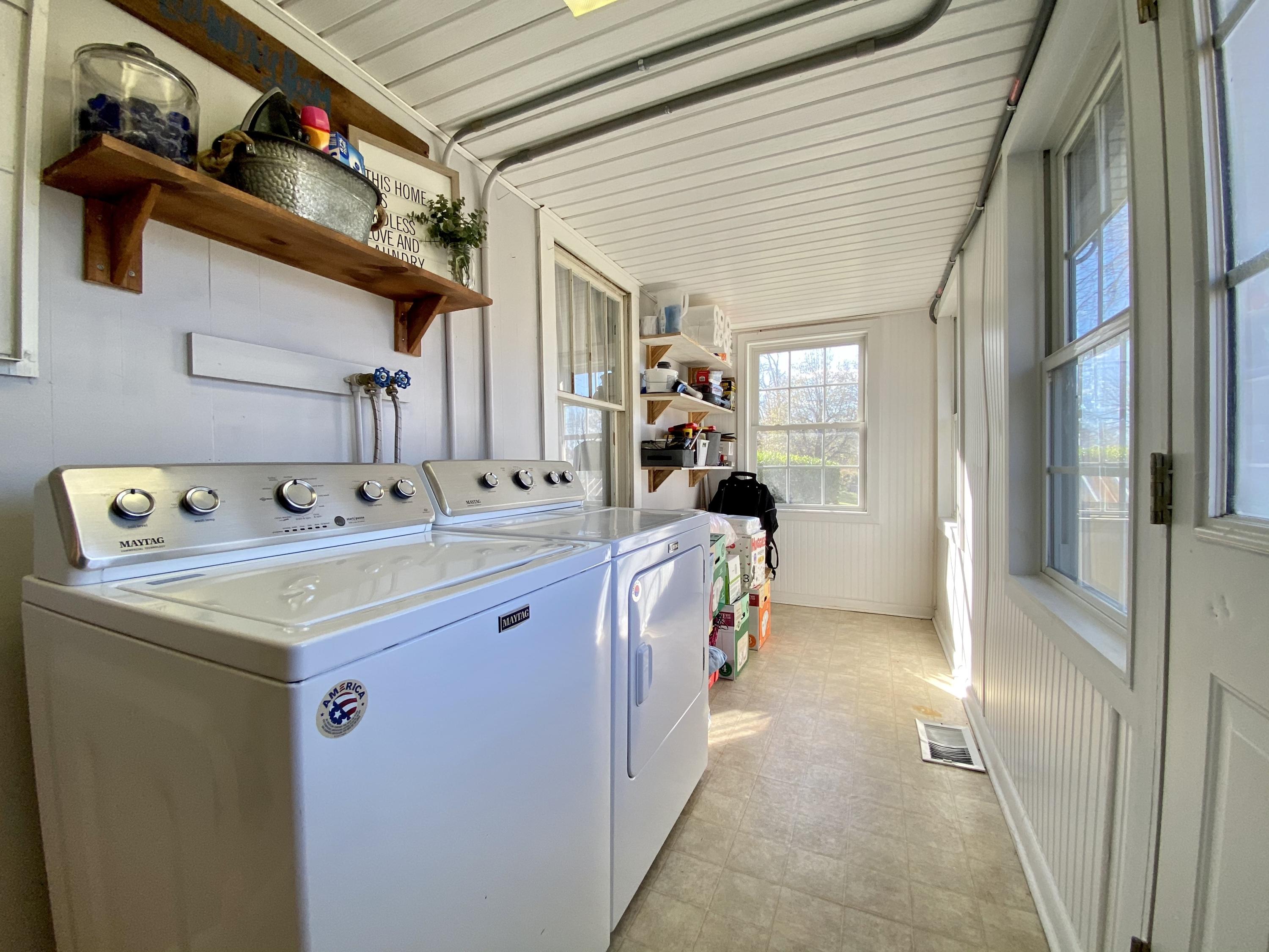 1121 Stone Mill Road Hurt, VA 24563 - Photo 28 of 28 a utility room with dryer and washer