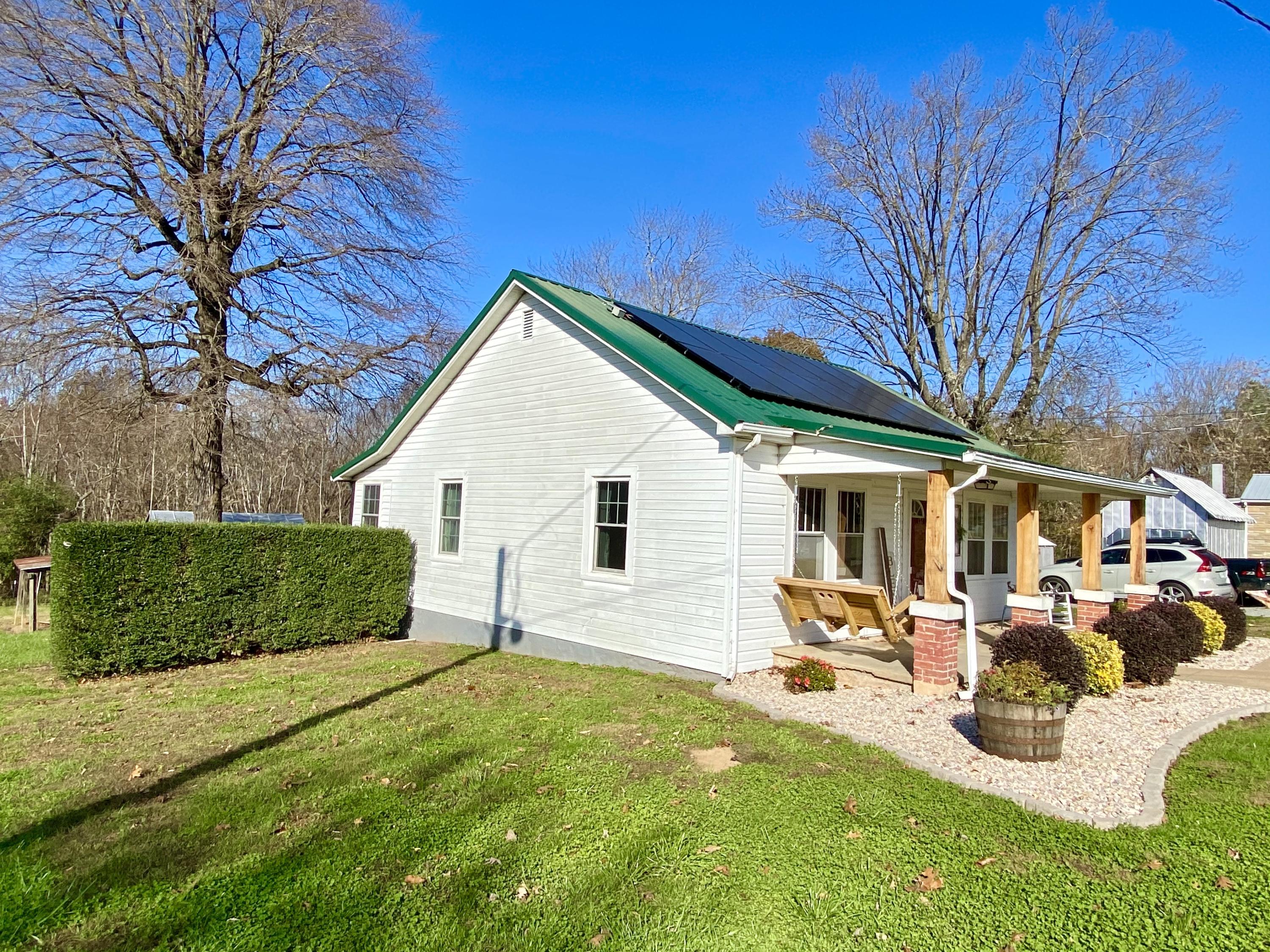 1121 Stone Mill Road Hurt, VA 24563 - Photo 4 of 28 a view of a backyard with a sitting area