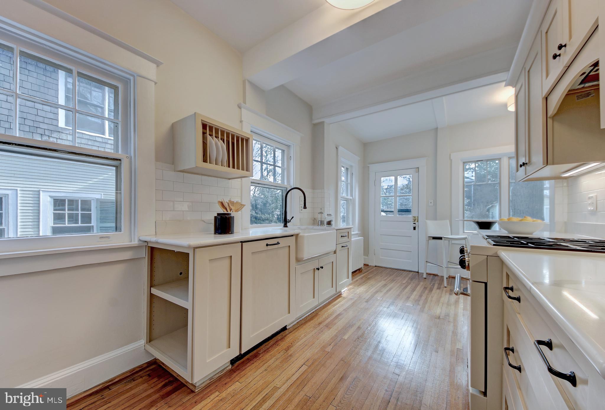 3414 Rodman Street Northwest Washington, DC 20008 - Photo 11 of 64 Renovated kitchen with plenty of storage space
