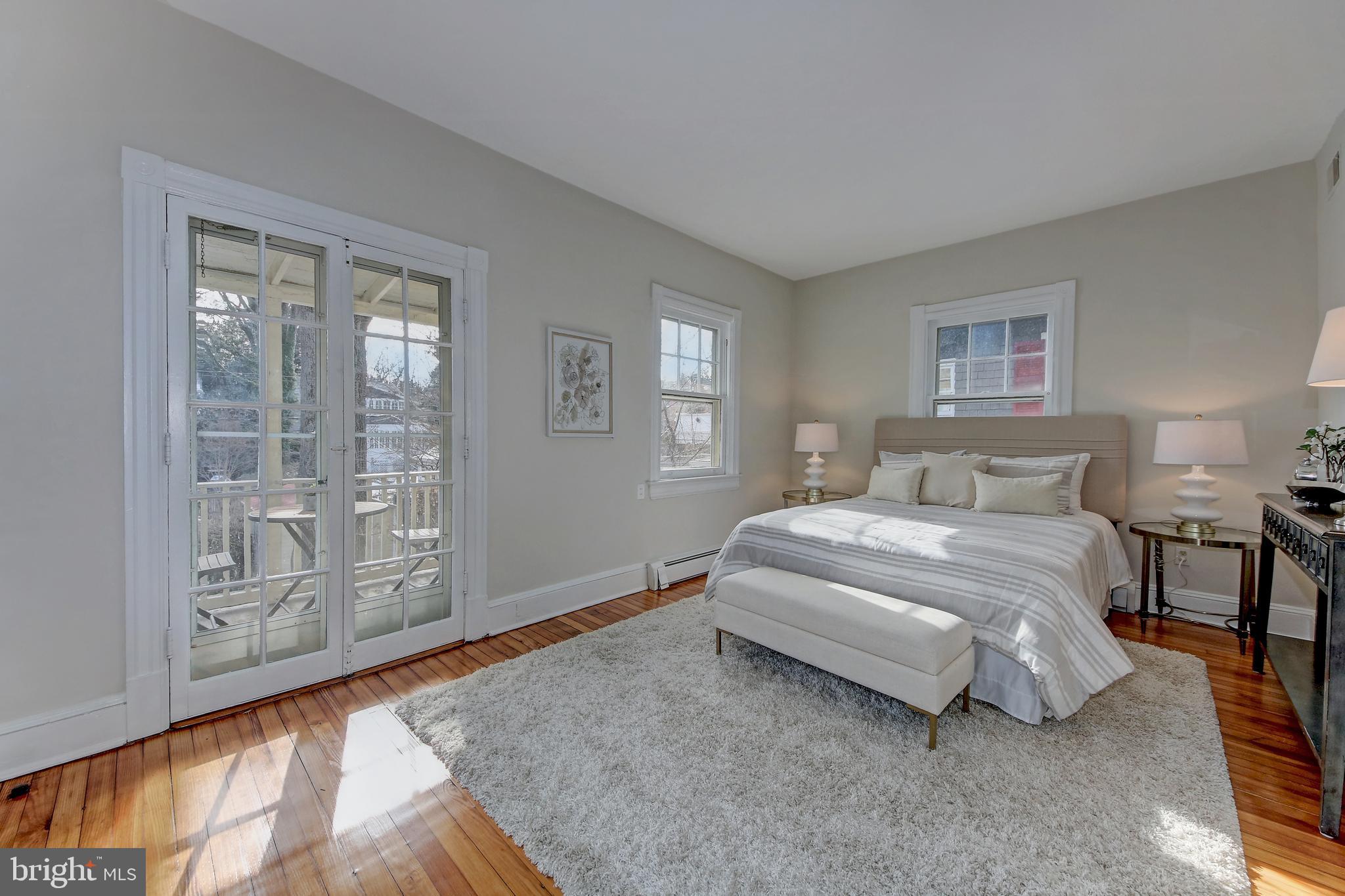 3414 Rodman Street Northwest Washington, DC 20008 - Photo 14 of 64 Sun kissed primary bedroom with two exposures