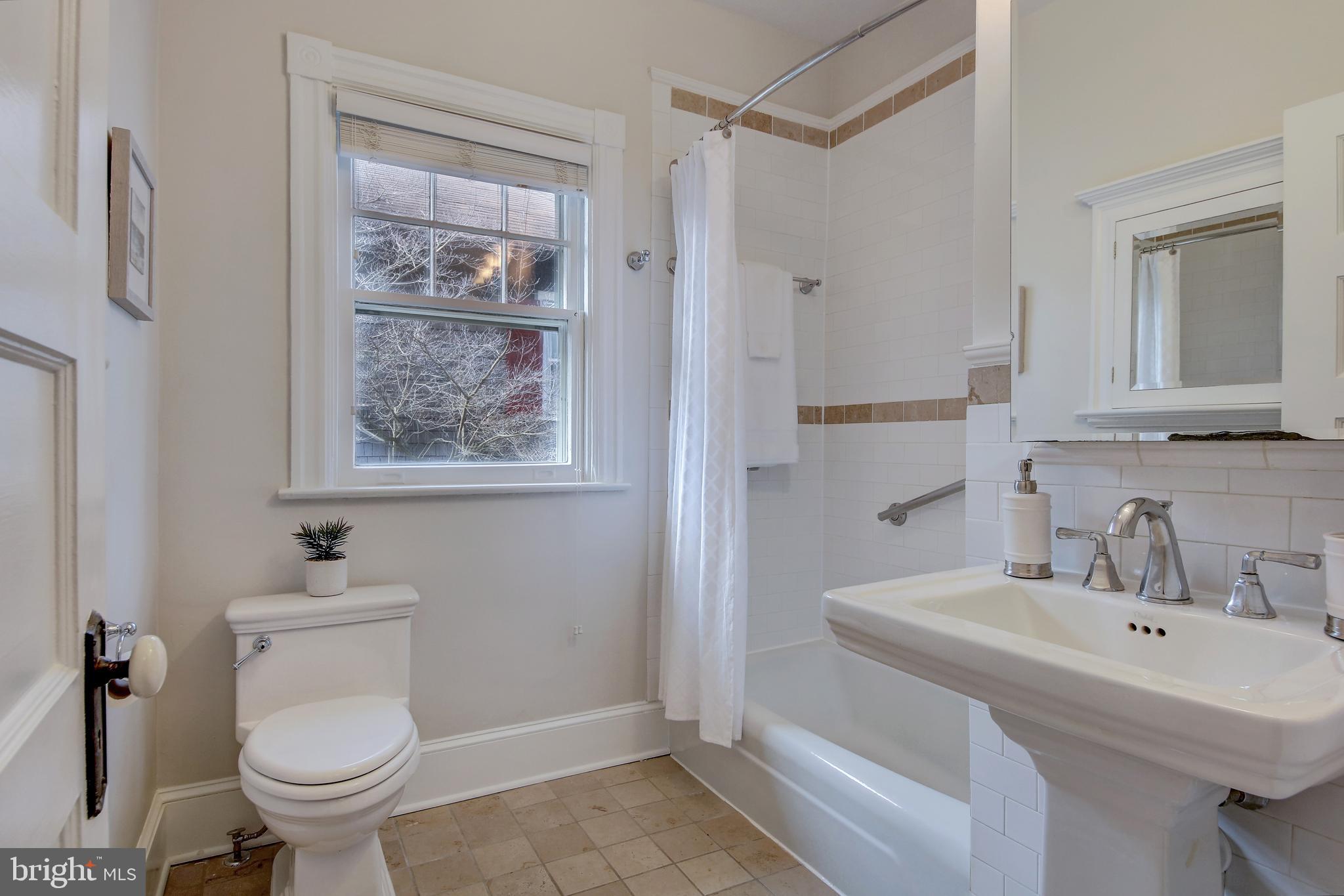 3414 Rodman Street Northwest Washington, DC 20008 - Photo 22 of 64 Upstairs hall bathroom is fully updated