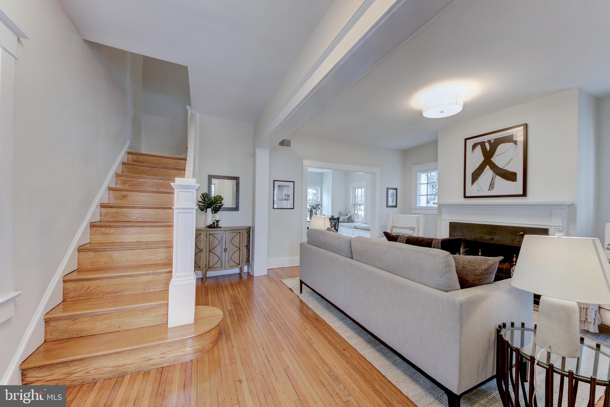 Sunny open living room and foyer