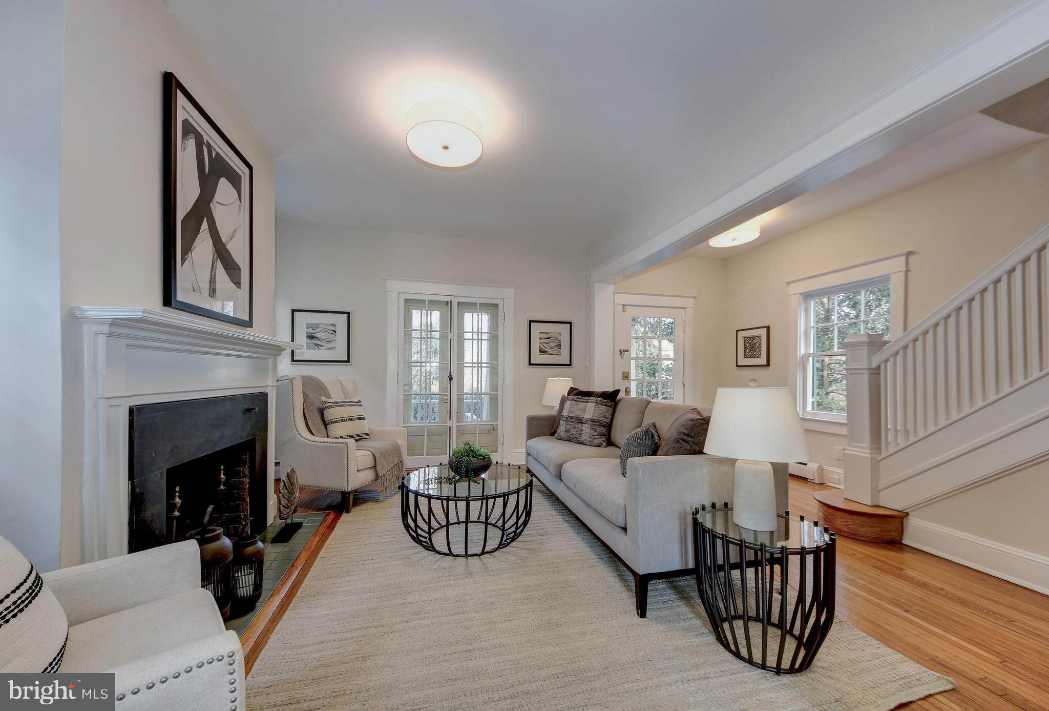 Anchored by wood burning fireplace