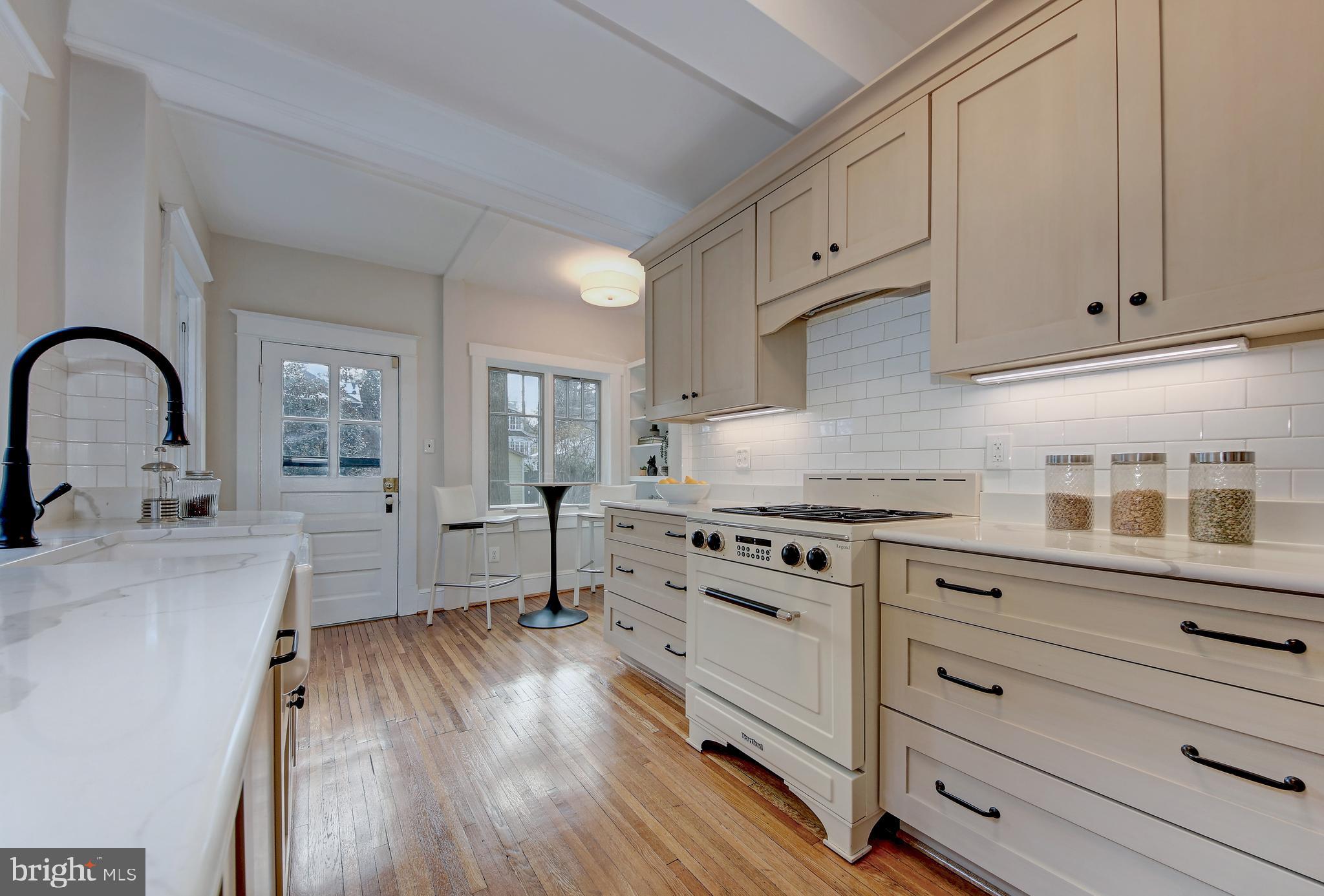 3414 Rodman Street Northwest Washington, DC 20008 - Photo 10 of 64 Updated crisp cream white kitchen