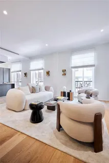 a bedroom with furniture and a couch