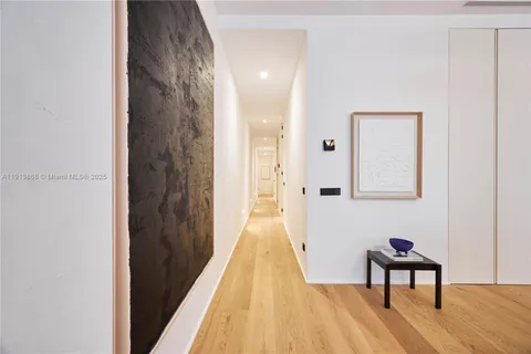 a view of a bedroom from a hallway