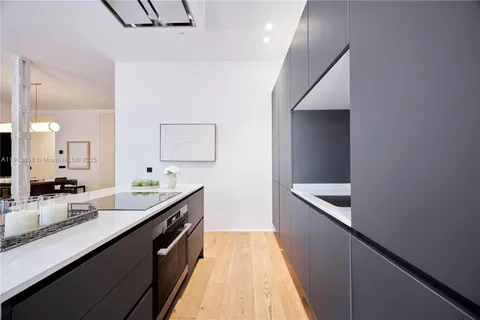 a spacious bathroom with a double vanity sink and a mirror